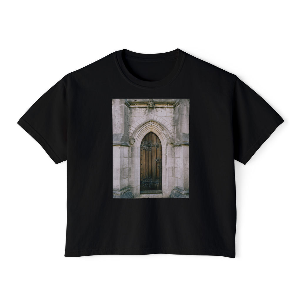The Door Boxy Tee in Black, front view, printed with a photo of a Gothic arched doorway