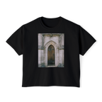 The Door Boxy Tee in Black, front view, printed with a photo of a Gothic arched doorway