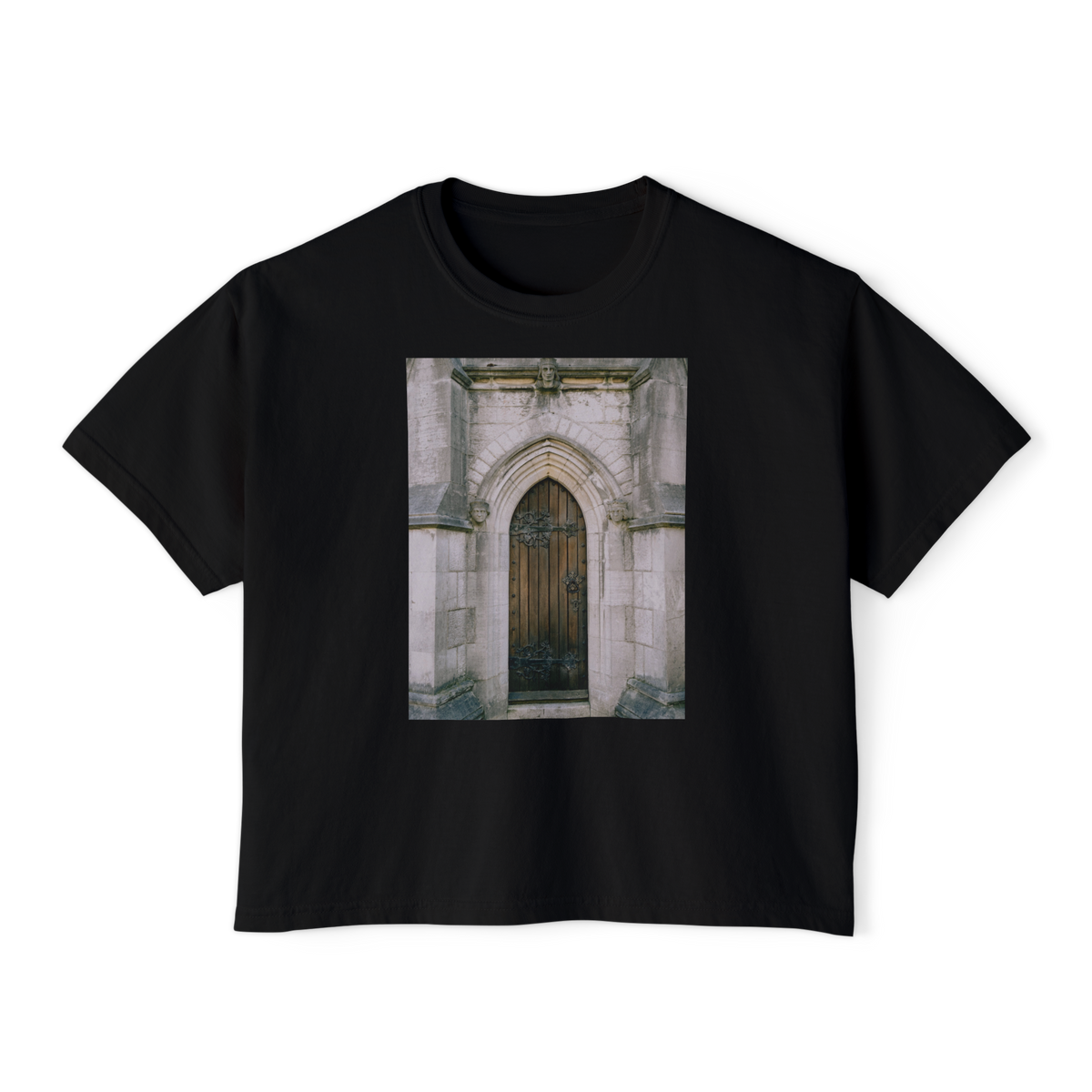 The Door Boxy Tee in Black, front view, printed with a photo of a Gothic arched doorway